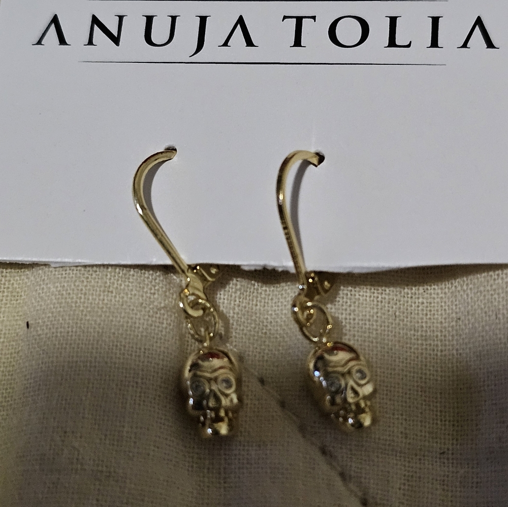 Skull huggie earrings